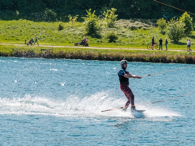 A man riding skis on top of a body of water