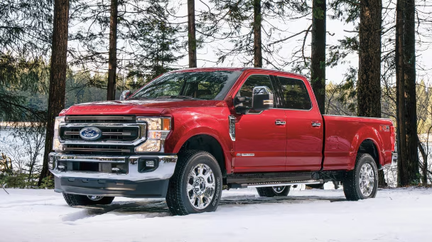 Red Ford Super Duty in the snow